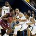 Michigan freshman Glenn Robinson III junior Jordan Morgan and sophomore Trey Burke try to steal the ball from IUPUI sophomore Jordan Shanklin on Monday. Daniel Brenner I AnnArbor.com